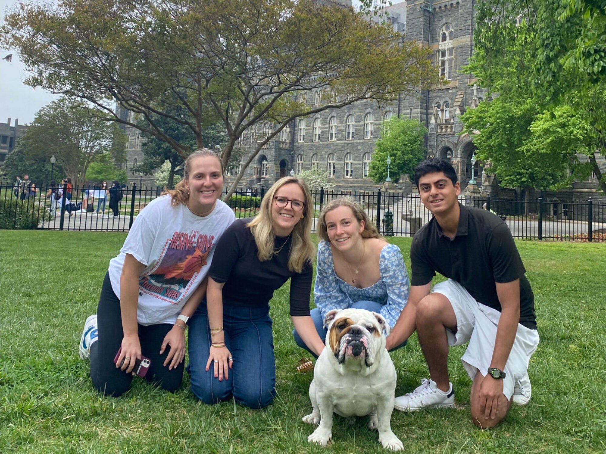 students posing with jack the bulldog