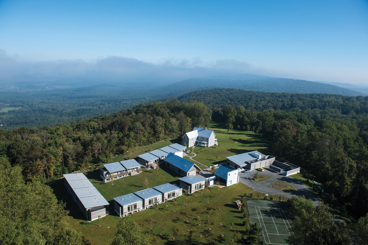 an aerial view of the Calcagnini Contemplative Center retreat buildings and cabins in the mountains of Virginia