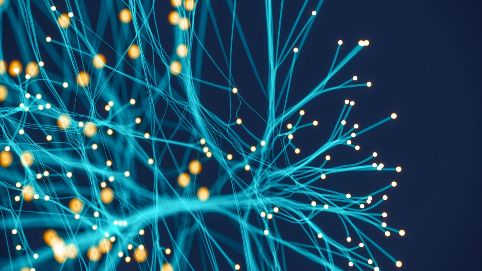 a teal network of electric fibers against a navy background. Photo: iStock