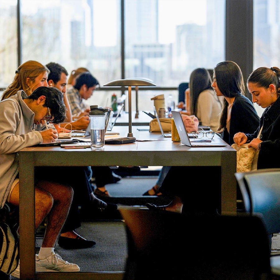 students studying at library