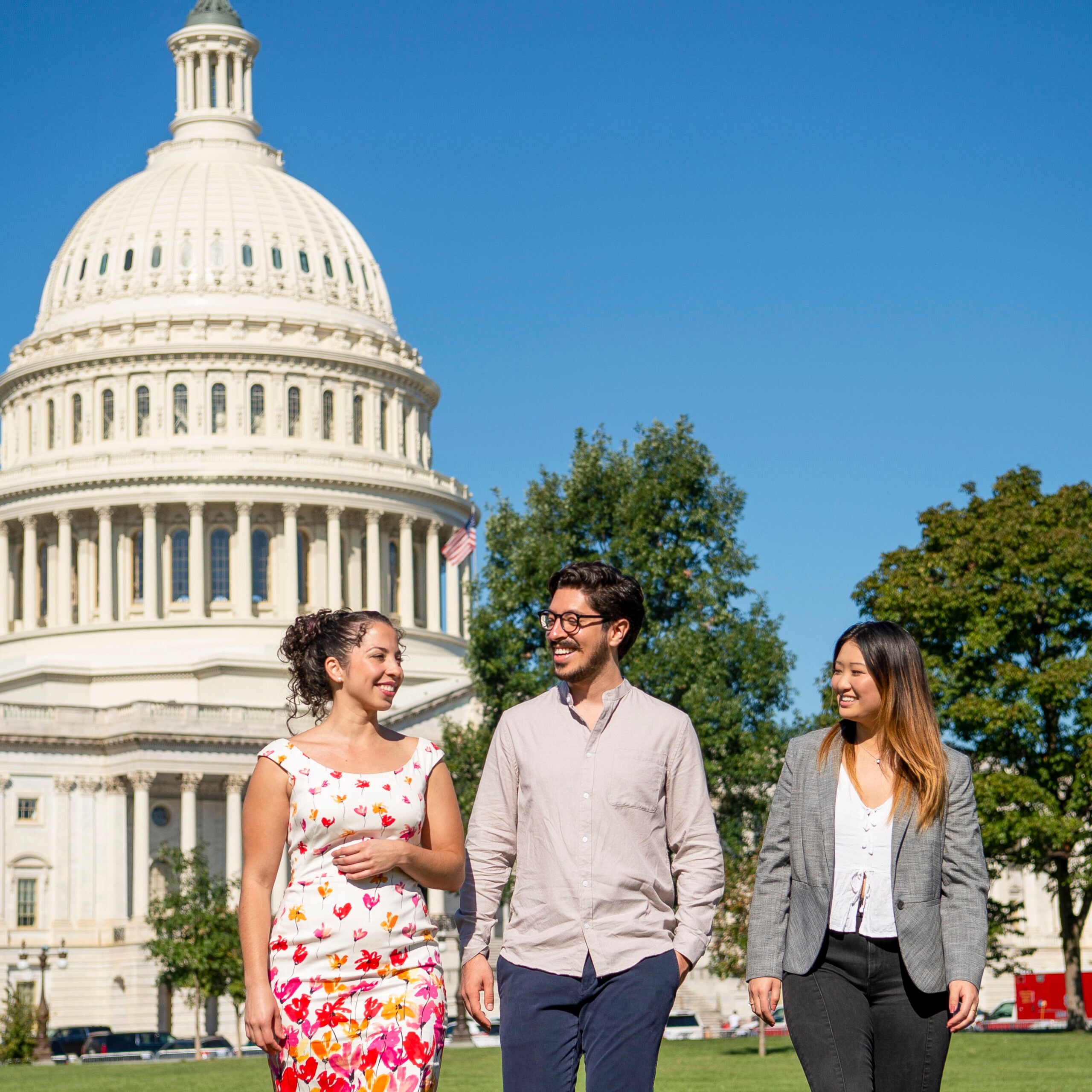 students walking in front of capitol building