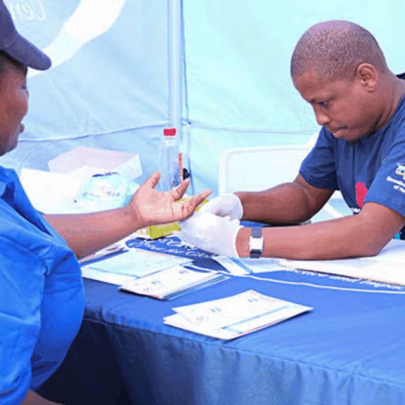 person giving a vaccine