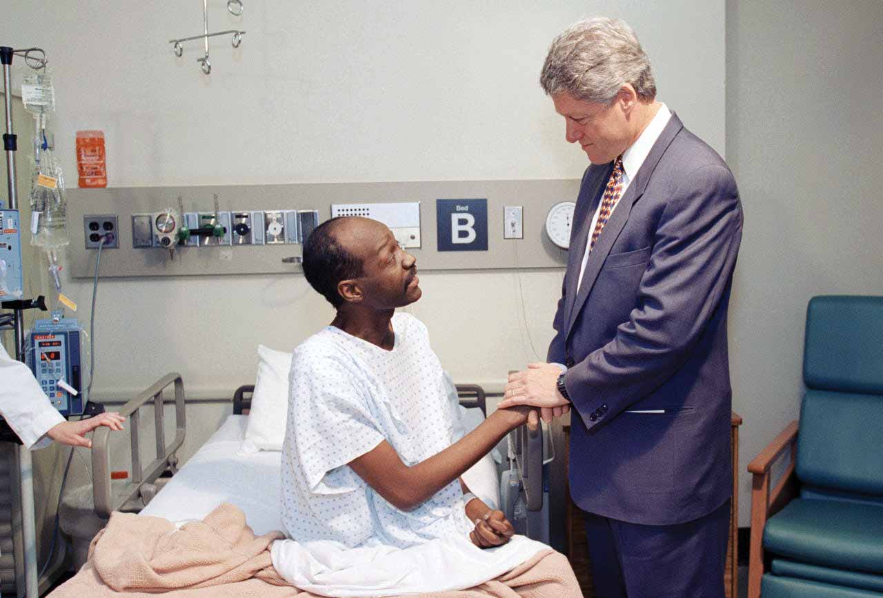 President Bill Clinton greets AIDS patient Larry Singletary